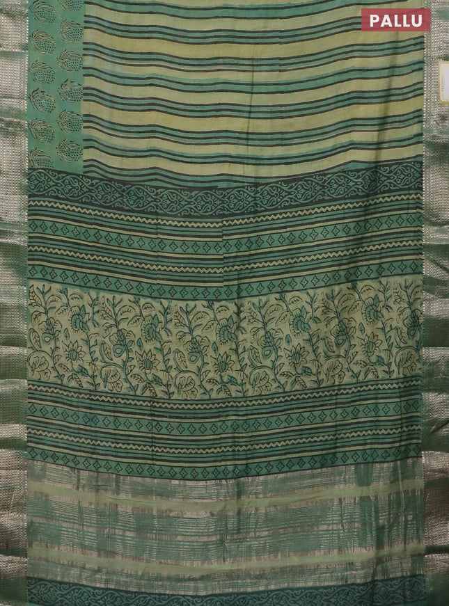 Semi chanderi saree pista green and teal green with allover vanaspathi prints and zari woven border
