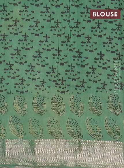 Semi chanderi saree pista green and teal green with allover vanaspathi prints and zari woven border
