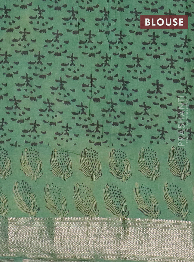 Semi chanderi saree pista green and teal green with allover vanaspathi prints and zari woven border