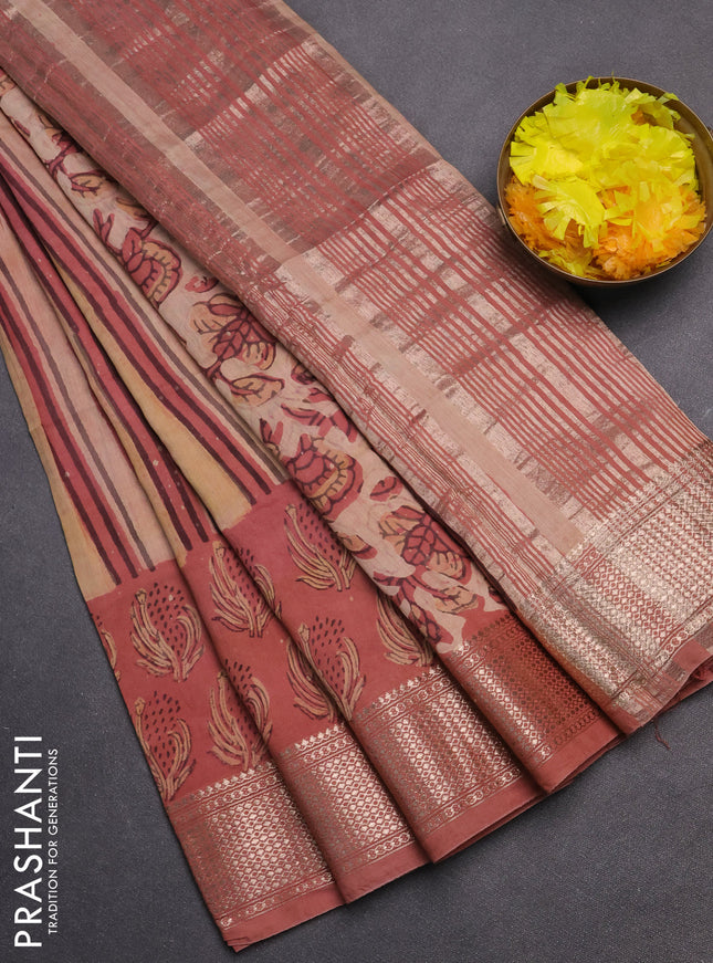 Semi chanderi saree sandal and pastel peach with allover vanaspathi prints and zari woven border