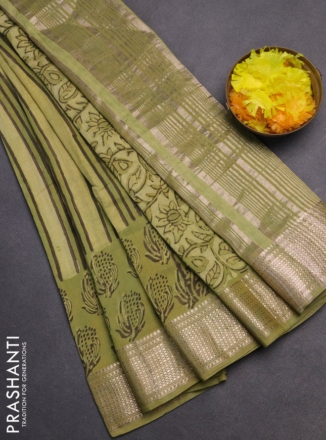 Semi chanderi saree pale yellow and pista green with allover vanaspathi prints and zari woven border