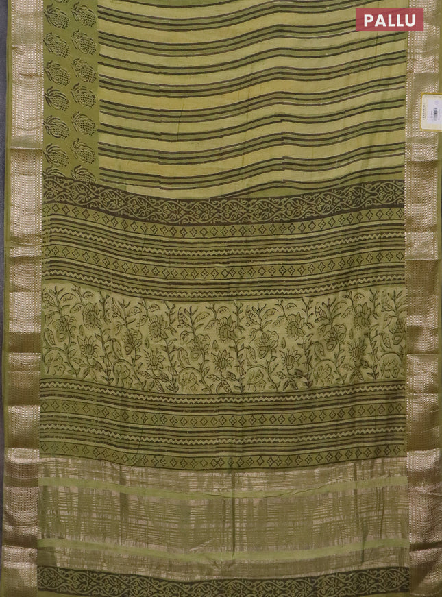 Semi chanderi saree pale yellow and pista green with allover vanaspathi prints and zari woven border