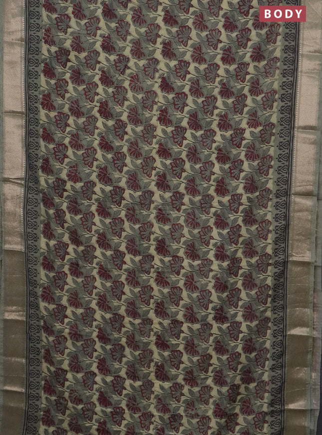 Semi chanderi saree pastel green with allover vanaspathi prints and zari woven border