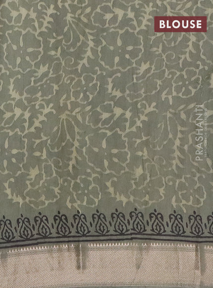 Semi chanderi saree pastel green with allover vanaspathi prints and zari woven border