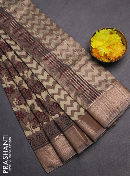 Semi chanderi saree beige and brown shade with allover vanaspathi prints and zari woven border