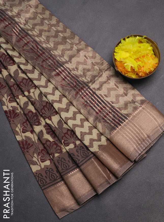 Semi chanderi saree beige and brown shade with allover vanaspathi prints and zari woven border