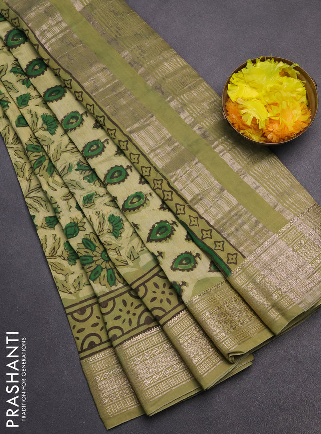 Semi chanderi saree pale yellow and pista green with allover vanaspathi prints and zari woven border