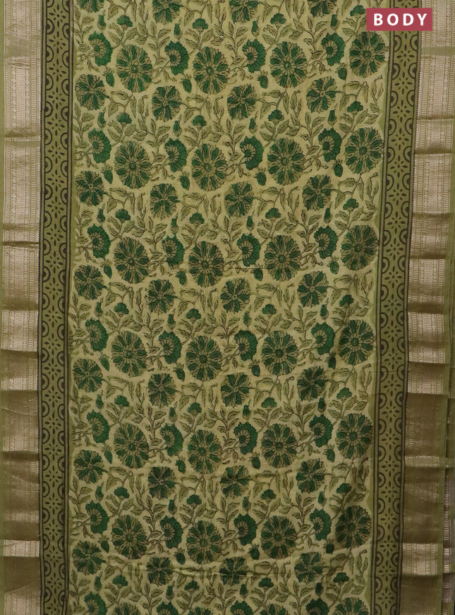 Semi chanderi saree pale yellow and pista green with allover vanaspathi prints and zari woven border