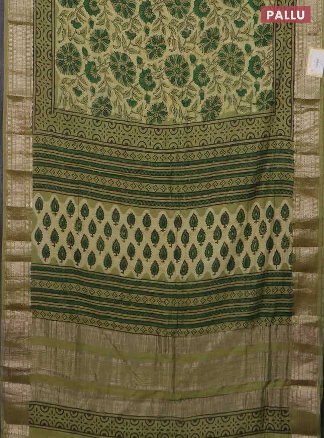 Semi chanderi saree pale yellow and pista green with allover vanaspathi prints and zari woven border
