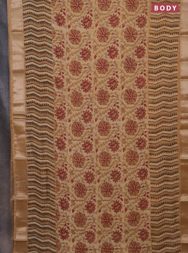 Semi chanderi saree sandal and pale orange with allover vanaspathi prints and zari woven border