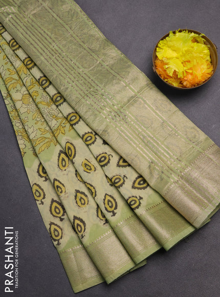 Semi chanderi saree pista green with allover vanaspati prints and zari woven border