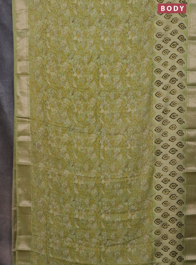 Semi chanderi saree pista green with allover vanaspati prints and zari woven border