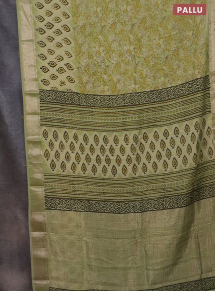 Semi chanderi saree pista green with allover vanaspati prints and zari woven border