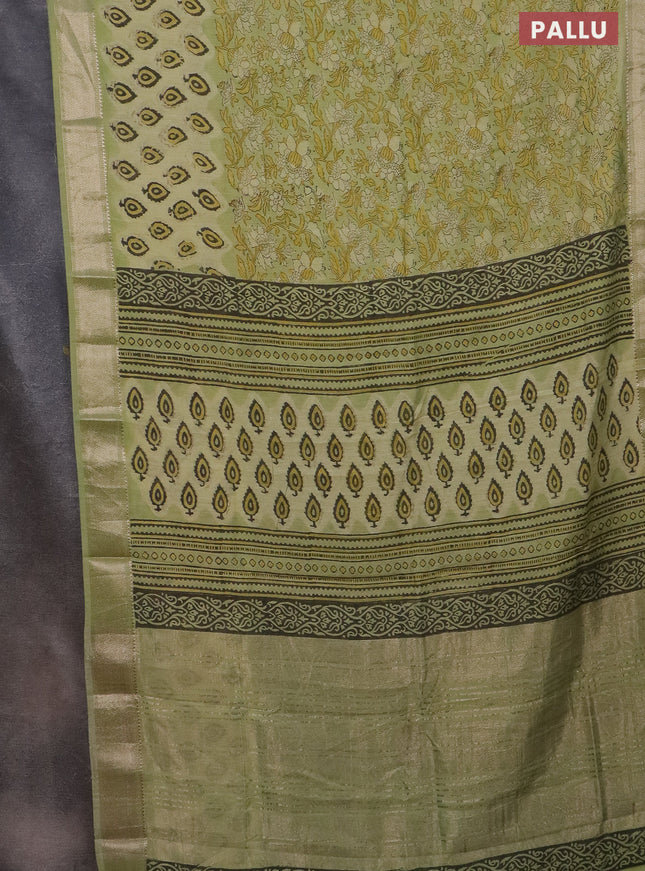 Semi chanderi saree pista green with allover vanaspati prints and zari woven border