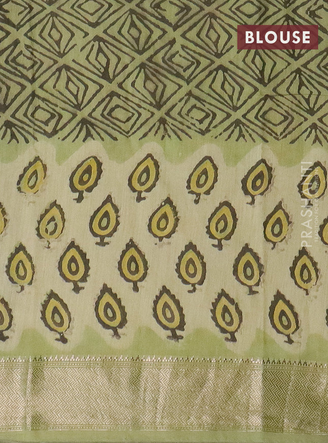 Semi chanderi saree pista green with allover vanaspati prints and zari woven border