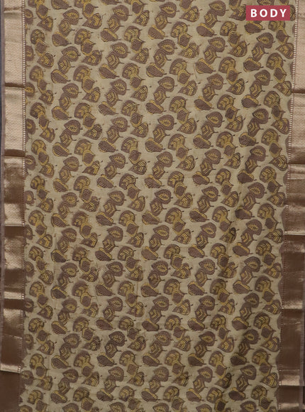 Semi chanderi saree beige and pastel brown shade with allover vanaspathi prints and zari woven border