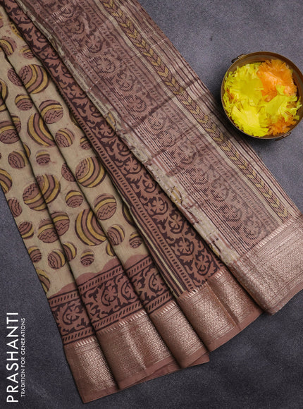 Semi chanderi partly saree beige and pastel brown with allover vanaspathi prints and zari woven border