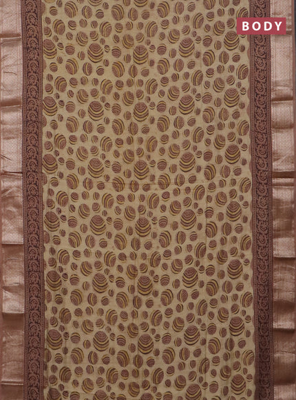 Semi chanderi partly saree beige and pastel brown with allover vanaspathi prints and zari woven border