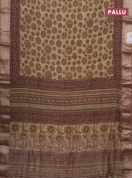 Semi chanderi partly saree beige and pastel brown with allover vanaspathi prints and zari woven border