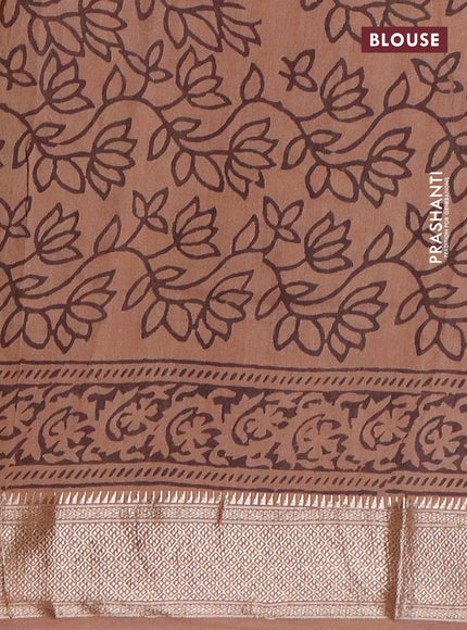 Semi chanderi partly saree beige and pastel brown with allover vanaspathi prints and zari woven border