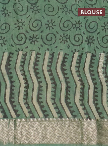 Semi chanderi saree pista green and teal green shade with allover vanaspathi prints and zari woven border