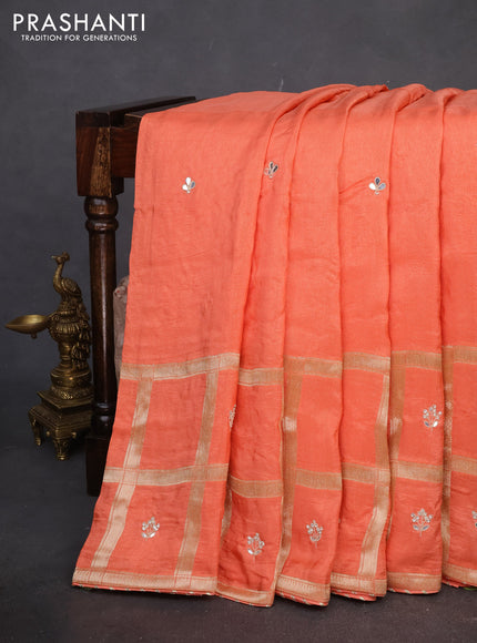 Satin crepe saree peach orange with embroidery work buttas and gottapatti work pallu