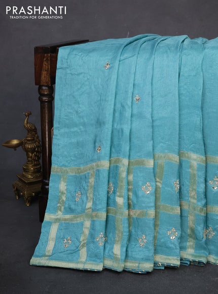 Satin crepe saree teal blue shade with embroidery work buttas and gottapatti work pallu
