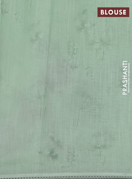 Linen cotton saree pastel green with plain body and floral prints & french knot work