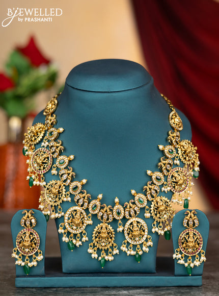 Antique necklace lakshmi design with kemp & cz stones and pearl & green beads hangings