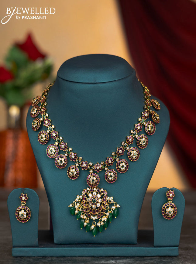 Antique necklace floral design with kemp & cz stones and pearl & green beads hangings