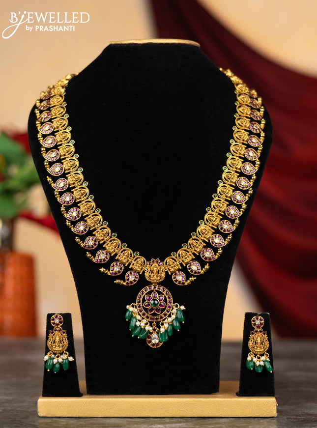 Antique haram lakshmi & manga design with kemp & cz stones and pearl & green beads hangings