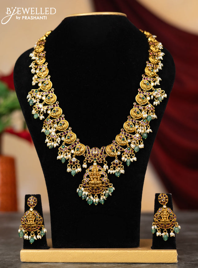 Antique haram lakshmi & manga design with kemp & cz stones and pearl & green beads hangings