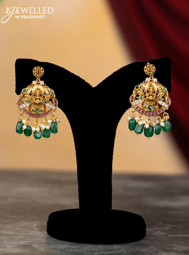 Antique haram lakshmi design with kemp & cz stones and pearl & green beads hangings