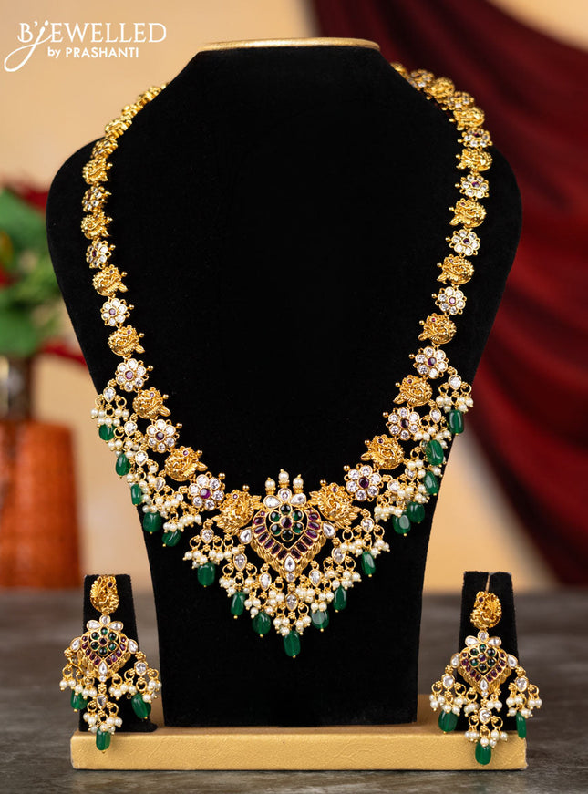 Antique haram floral & peacock design with kemp & cz stones and pearl & green beads hangings