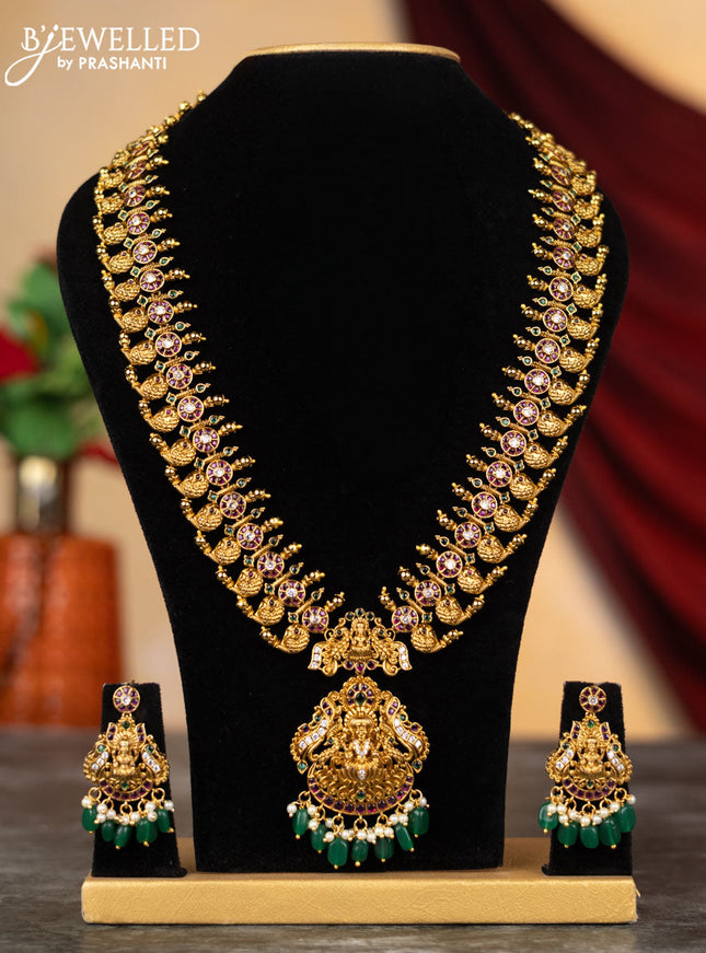 Antique haram lakshmi & manga design with kemp & cz stones and pearl & green beads hangings