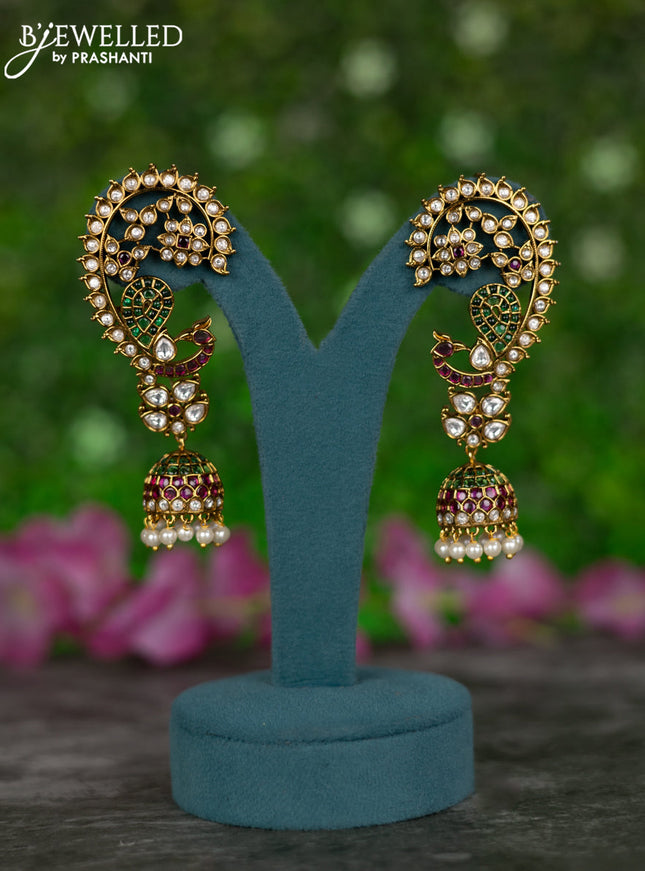 Antique earcuff jhumkas peacock design with kemp & kundan stones and pearl hangings
