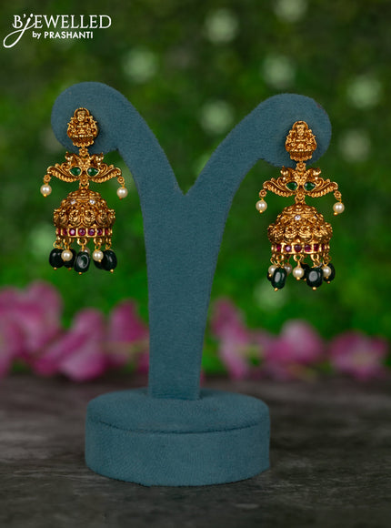 Antique jhumkas lakshmi design with kemp & cz stones and pearl & green beads hangings