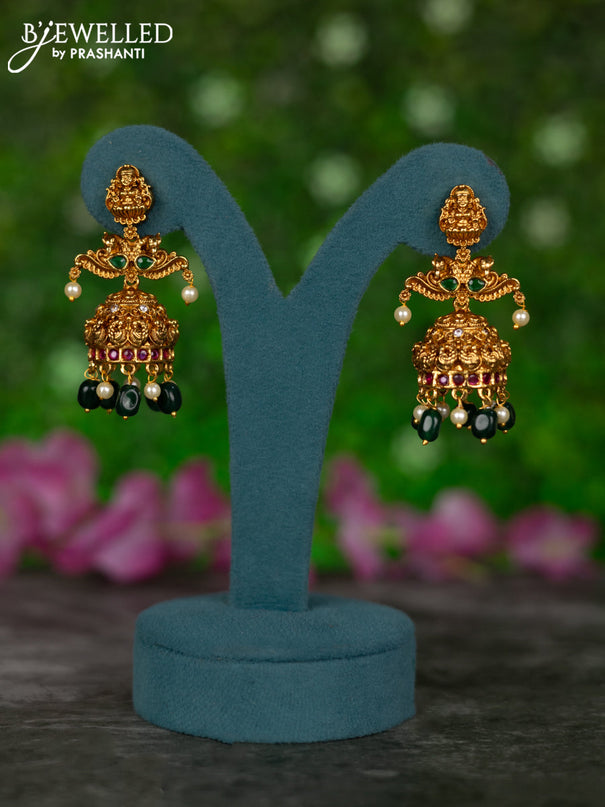 Antique jhumkas lakshmi design with kemp & cz stones and pearl & green beads hangings