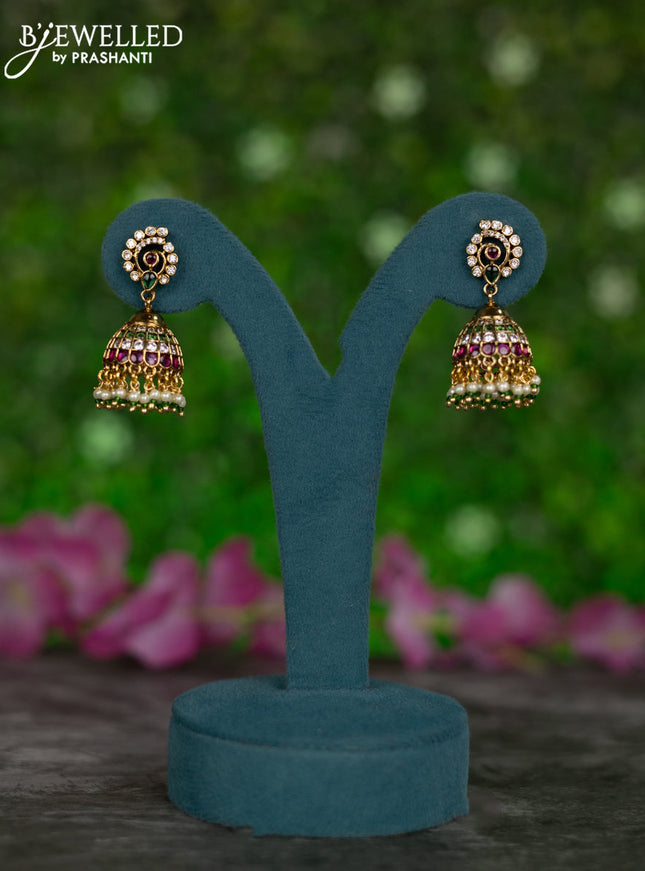 Antique jhumkas with kemp & cz stones and pearl hangings