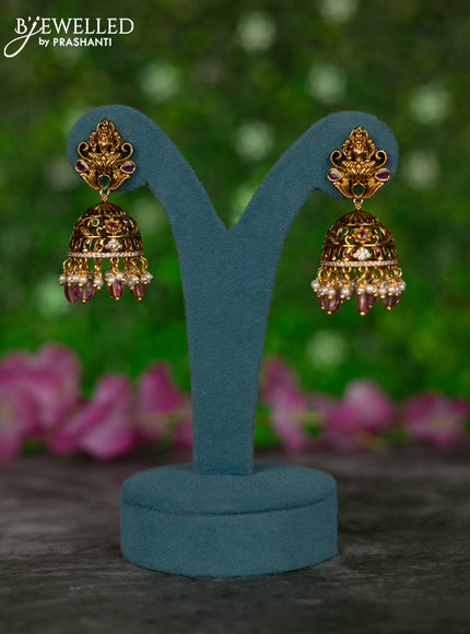 Antique jhumkas lakshmi design with kemp & cz stones and pearl & pink beads hangings