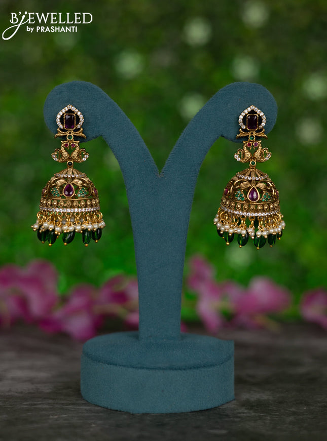 Antique jhumkas peacock design with kemp & cz stones and pearl & green beads hangings