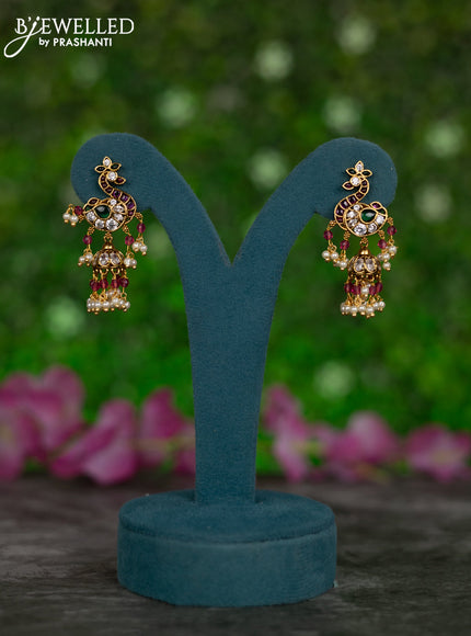 Antique jhumkas peacock design with kemp & cz stones and pearl & pink beads hangings