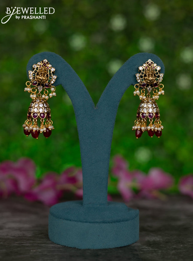 Antique jhumkas lakshmi design with kemp & cz stones and pearl & pink beads hangings