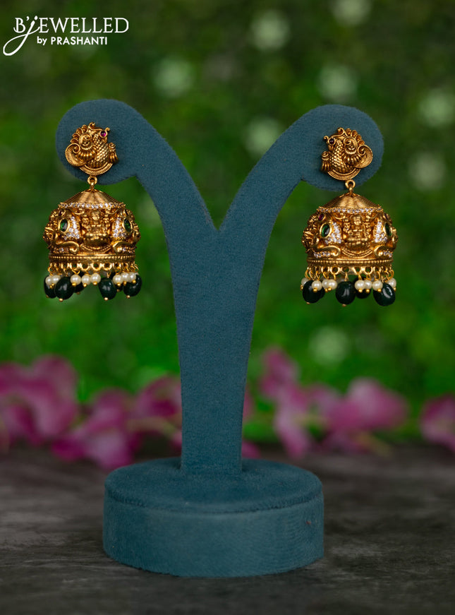 Antique jhumkas peacock & lakshmi design with kemp & cz stones and pearl & green beads hangings