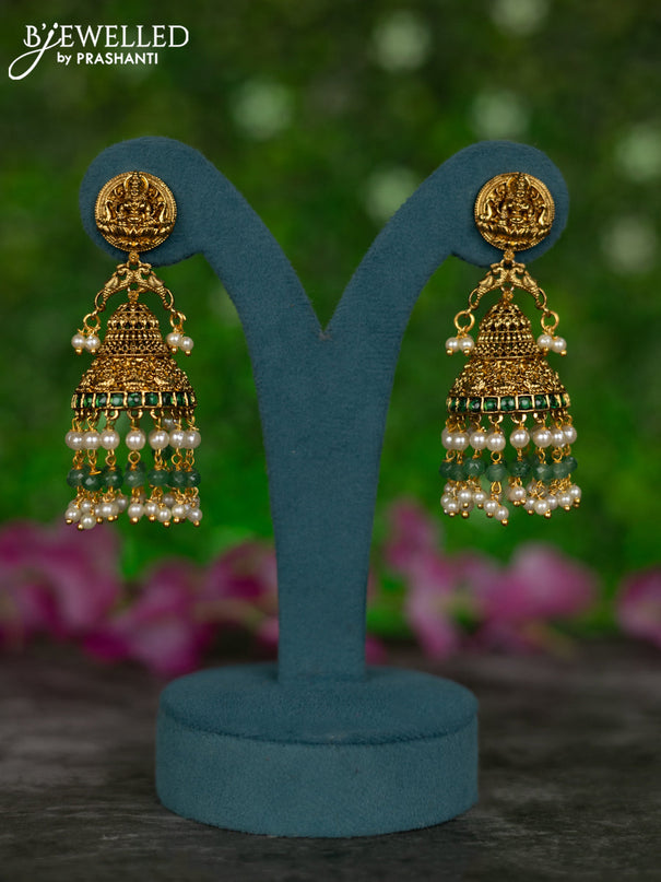 Antique jhumkas lakshmi design with green kemp & cz stones and pearl & green beads hangings