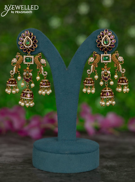 Antique jhumkas peacock design with kemp & cz stones and pearl hangings
