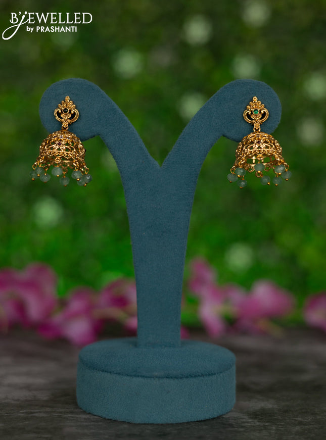 Antique jhumkas with kemp & cz stones and mint green beads hangings