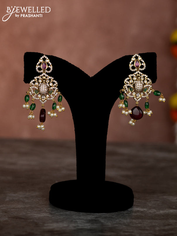 Beaded multilayer green red necklace lakshmi & ganesha pendant with emerald kundan & cz stones and pearl hangings in victorian finish