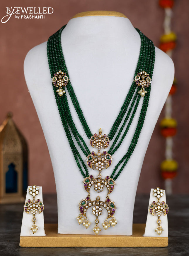 Beaded multilayer green necklace chandbali pendant with kemp & cz stones and pearl hangings in victorian finish