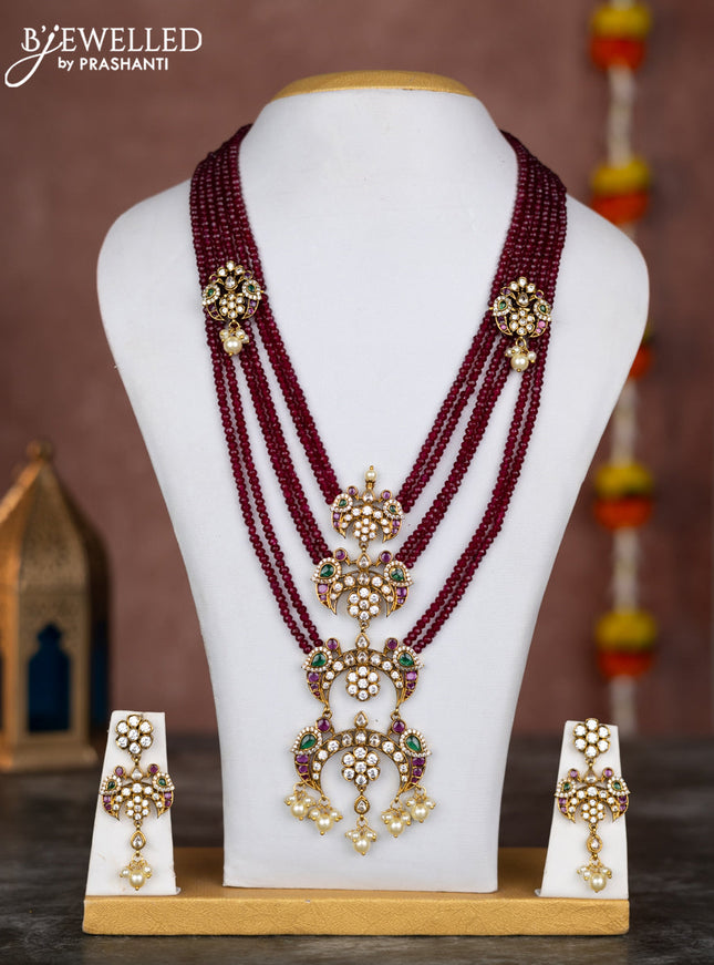 Beaded multilayer maroon necklace chandbali pendant with kemp & cz stones and pearl hangings in victorian finish